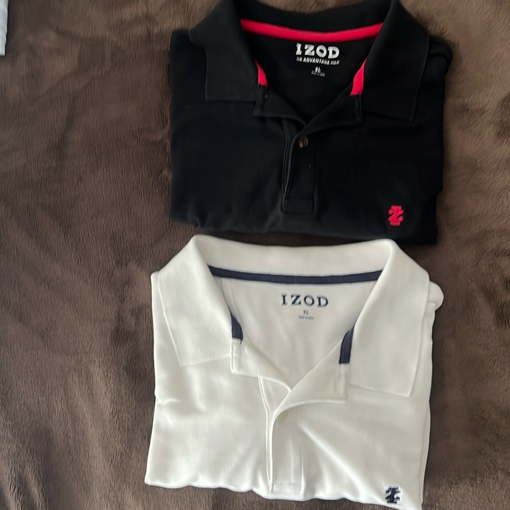 2 Izod XL polo shirts.  White with navy writing and Black with red writing.